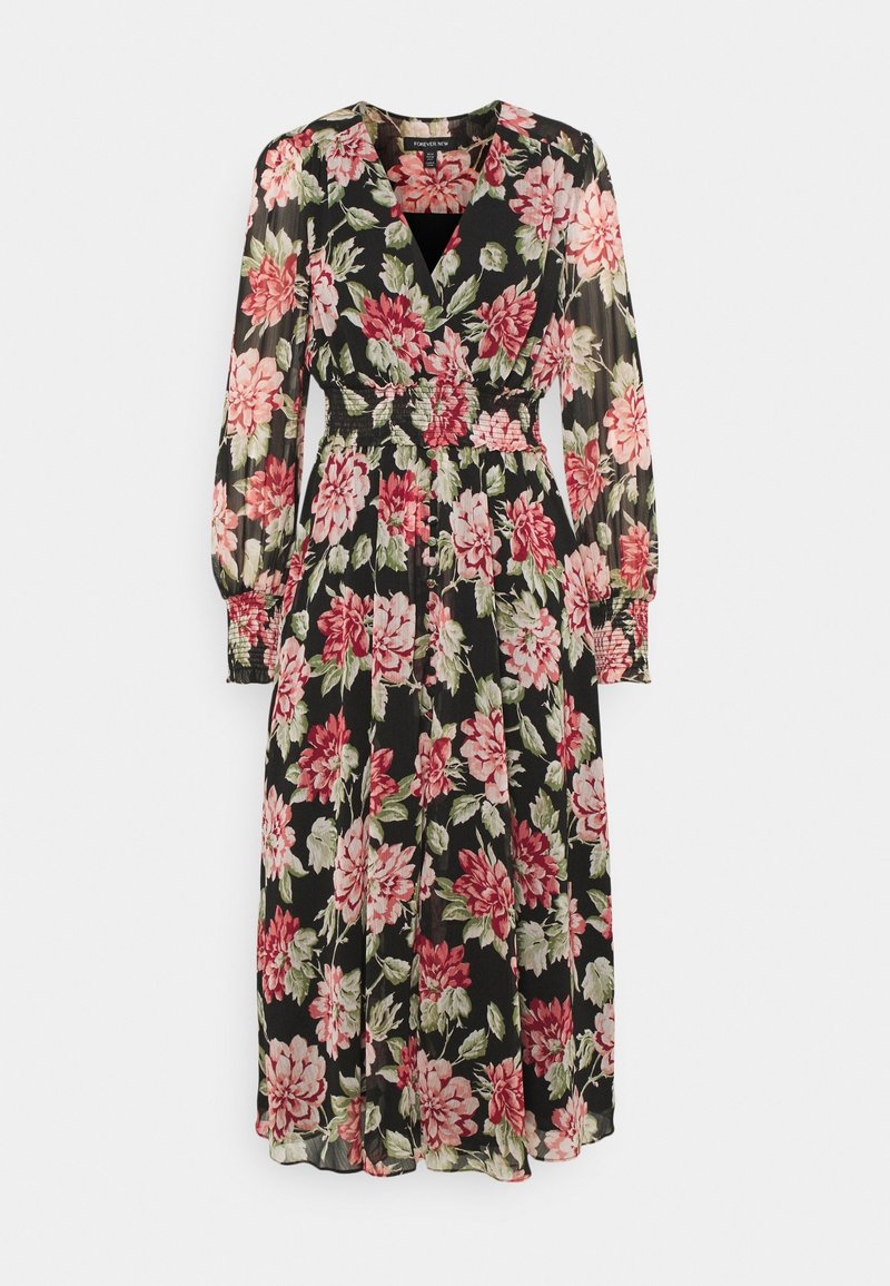 Robe midi noire à imprimé floral rose et blanc, manches longues bouffantes, taille smockée et décolleté en V.