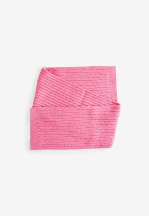 Avvolgimento in tessuto a coste rosa con un design testurizzato, piegato in modo sovrapposto, presenta un aspetto morbido e accogliente.