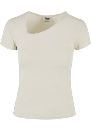 Camiseta de color crema de manga corta con escote redondo, hecha de un suave tejido de algodón, que presenta una silueta ajustada y sin patrones visibles.