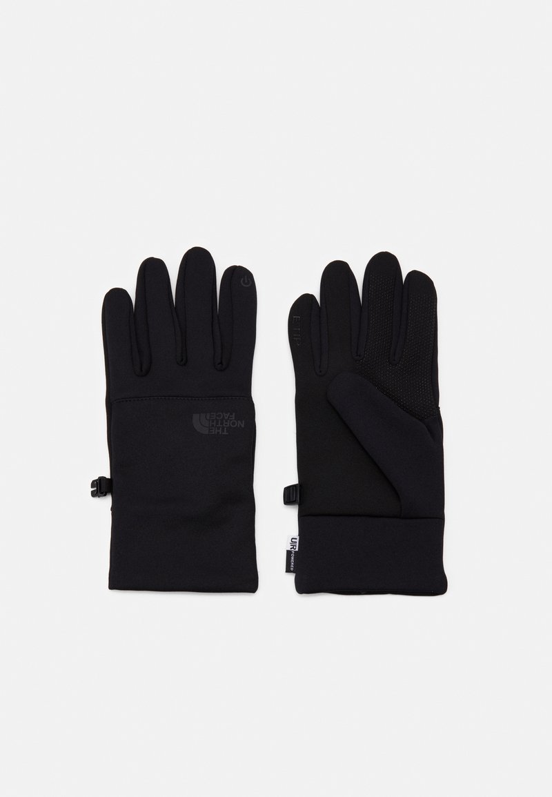 Gants noirs en tissu extensible, au design élégant. Comprend une pointe compatible avec les écrans tactiles et des accents de prise texturée.