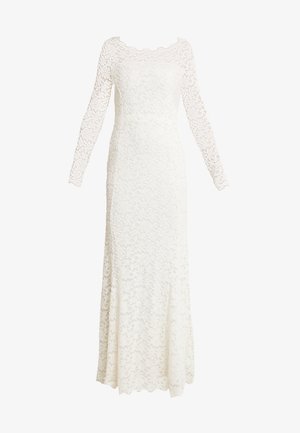 Robe en dentelle à manches longues de couleur blanche, avec un col en dents de scie et des motifs floraux, dotée d'un corsage ajusté et d'une jupe fluide.