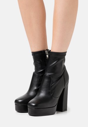 WALKER - Kotníková obuv na vysokém podpatku - black