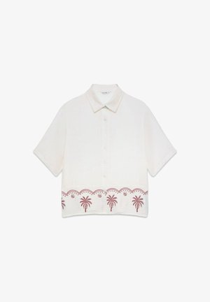 White short-sleeve button-up shirt with collar and red palm tree and scallop pattern along the bottom hem.
