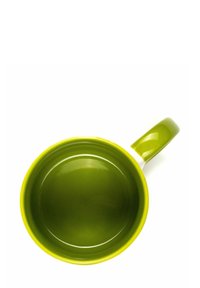 Green ceramic mug with a glossy finish, yellow rim, and a round shape. Features a side handle for easy grip.