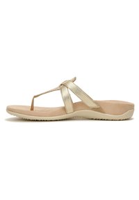 Gold flip-flop sandal with a thong strap, soft beige footbed, and a textured sole for grip. Smooth metallic bands accent the design.
