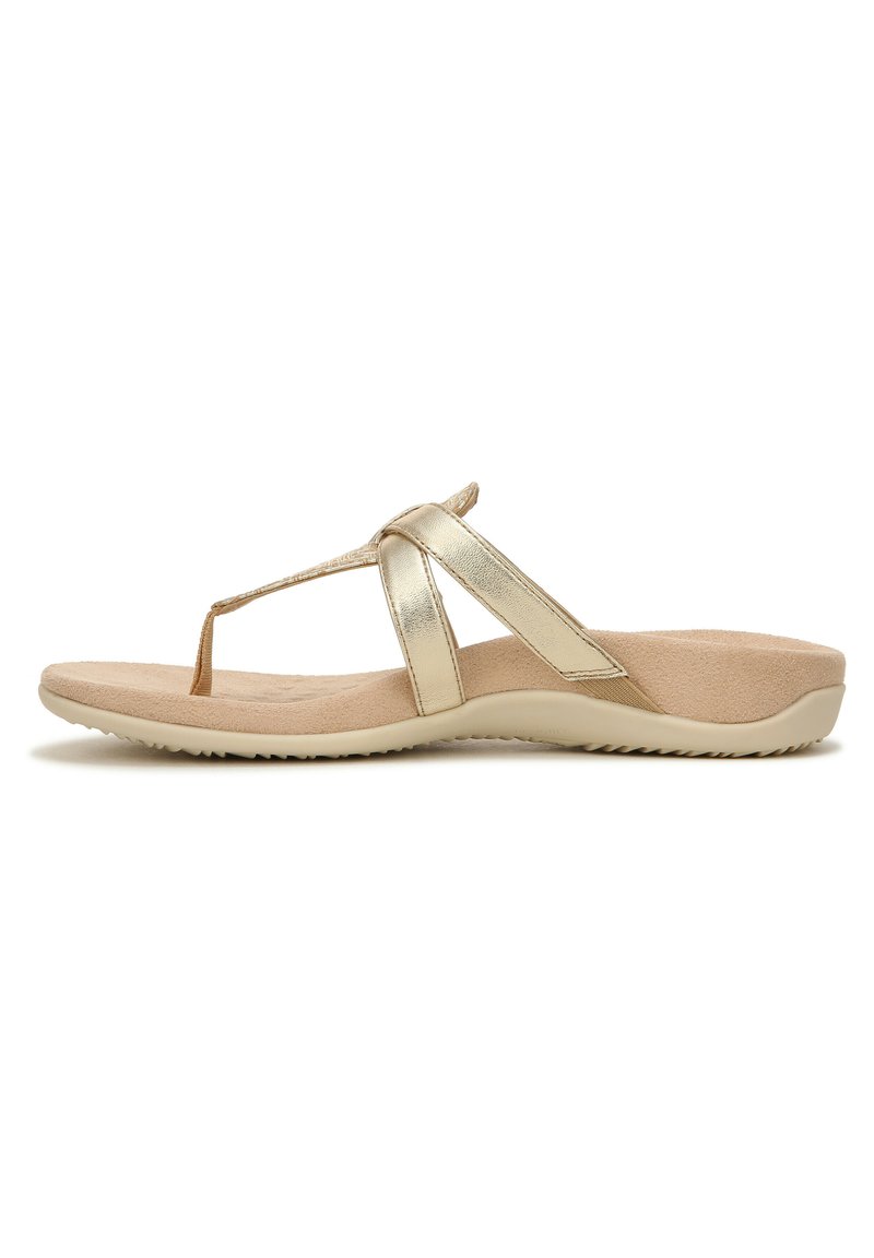 Gold flip-flop sandal with a thong strap, soft beige footbed, and a textured sole for grip. Smooth metallic bands accent the design.