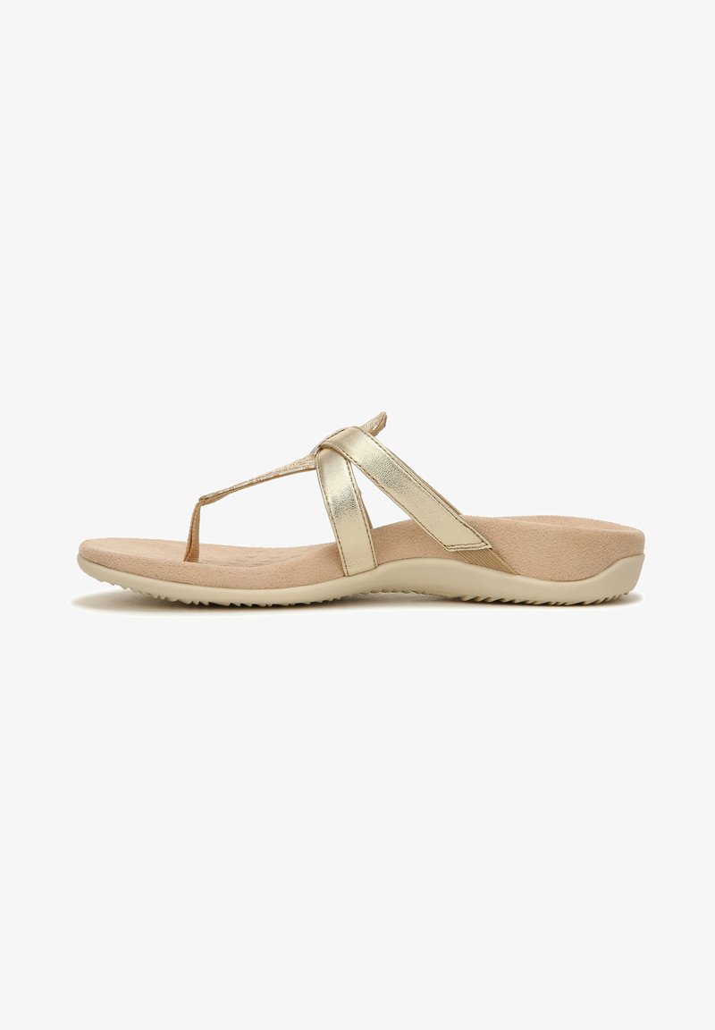 Gold flip-flop sandal with a thong strap, soft beige footbed, and a textured sole for grip. Smooth metallic bands accent the design.