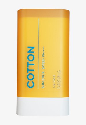 Geel-witte zonne-stick verpakking met label "COTTON Sun Stick SPF50+ PA++++" met merknaam "MISSHA" en netto gewicht 17g/0,59 oz.