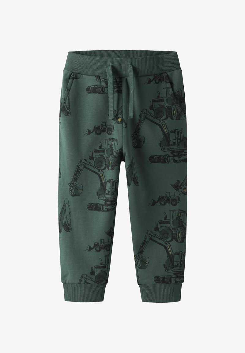 Zaļas kokvilnas sporta bikses ar vispārējo melnu būvtehnikas druku. Elastīgs viduklis ar aukliņu un ribots aproces.