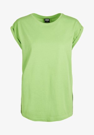 Šviesiai žalia trumpomis rankovėmis marškinėliai, pagaminti iš minkštos medžiagos, suapvalintu iškirpimu ir suvirintomis rankovėmis, šonais išpjautomis patogumui.