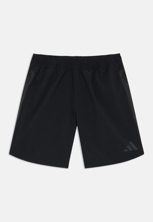 Schwarze sportliche Shorts mit elastischem Bund, zwei seitlichen Reißverschlusstaschen und einem dezenten Logo am unteren linken Bein.