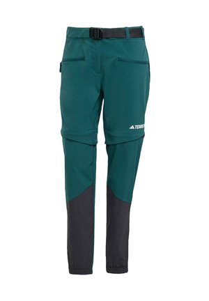 Pantaloni tecnici verdi con dettagli neri, dotati di cintura, tasche laterali e un design affusolato per una vestibilità moderna.