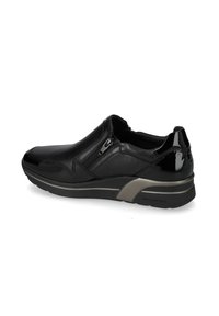 Sneaker nera senza lacci con cerniera laterale, punte e talloni lucidi, suola ammortizzata e design a profilo basso.