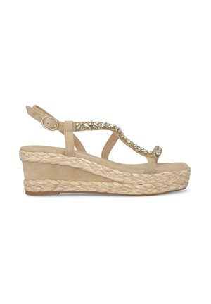 Sandalo a zeppa beige con suola in juta, caratterizzato da un design a T decorato con strass e una cinghia regolabile alla caviglia.