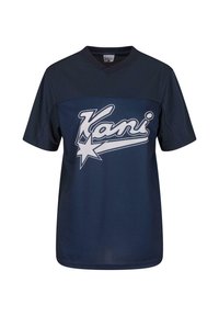 Tamsiai mėlynas sportinis marškinėlis trumpomis rankovėmis, V formos iškirpte, su baltu „Kani“ logotipu ant priekio, kuriame yra žvaigždės dizainas. Lygus, lengvas audinys.