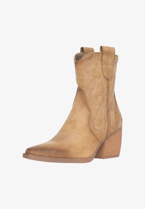 Tan cowboy boot with pointed toe, stitched floral designs, and a block heel. Smooth leather texture with pull-on tabs.