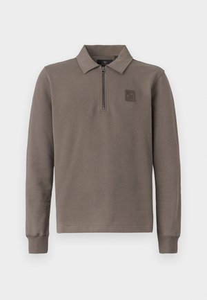 Long-sleeve brown polo shirt with quarter zip and a small patch logo on the left chest, displayed on a white background.