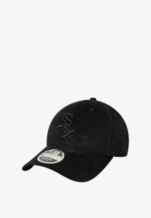 Black corduroy cap with a curved brim, featuring an embroidered logo on the front. Includes a size sticker on the peak.