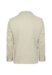 Beige blazer van zachte stof, met een enkele achteropening, lange mouwen en knoopmanchetten. Eenvoudig ontwerp met een getailleerde pasvorm.