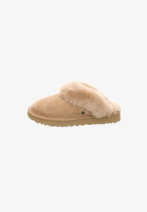 Pantofole in suede tan foderate in ecopelliccia, con punta morbida e arrotondata e suola in gomma; presentano un soffice risvolto per un comfort e calore aggiuntivi.