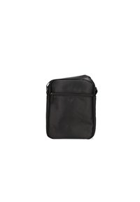 Borsa a tracolla nera realizzata in tessuto morbido. Presenta una tasca frontale con zip, una tracolla regolabile e una forma rettangolare.