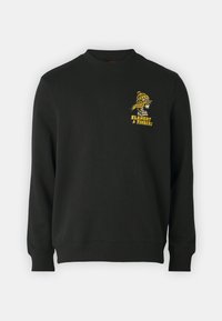 Zwarte sweatshirt met lange mouwen, geribbelde ronde hals en omgeslagen manchetten. Kenmerkt zich door een gele grafische print van een karakter op de linkerborst.