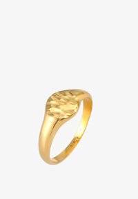 Seleccionado, gold-coloured