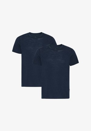 Tummansininen crew-neck T-paita kaksin kappalein. Valmistettu pehmeästä kankaasta, jossa on hieman teksturoitu pinta ja lyhyet hihat.