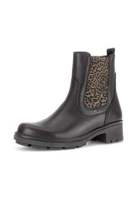 Botín negro de cuero hasta el tobillo con panel lateral de elastano de leopardo, puntera redonda, suela de goma y tira en la parte trasera. Tacón ligeramente grueso.