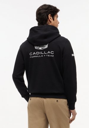 Tommy Hilfiger, TH X CADILLAC FORMULA 1 TEAM REPLICA HOODIE UNISEX - Hoodie - black