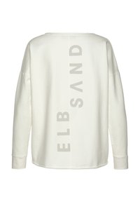 Crewneck Sweatshirt aus off-weißem Baumwollstoff mit oversized Passform, angeschnittenen Schultern und einer großen grauen Textgrafik "ELB SAND", die vertikal in der Mitte angebracht ist.
