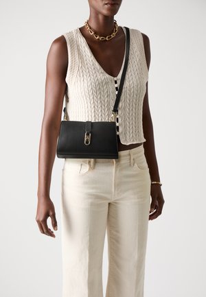 Tommy Hilfiger LIBRE MINI CROSSOVER - Cross body bag - black
