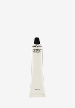 Weißer Kunststoffbehälter mit tapered Design, schwarzem Drehverschluss und schwarzem Text. Enthält altersreparierenden Moisturizer mit Weißtee-Extrakt. 65 ml.