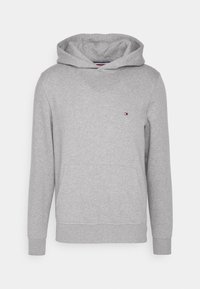 Sudadera gris hecha de una suave mezcla de algodón, con un bolsillo canguro, puños acanalados y un pequeño logo en el pecho.