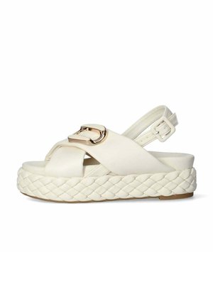 Sandali con zeppa in pelle bianca con suola in juta intrecciata, caratterizzati da un design a cinturino incrociato e dettagli in rame dorato.