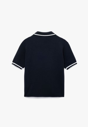 Polo shirt navy con maniche corte, colletto classico e finiture bianche sul colletto e sui bordi delle maniche. Tessuto a maglia testurizzato.