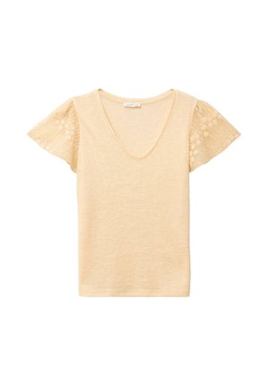 Beige kvindetop med V-hals og korte, halvgennemsigtige flæseærmer med blomsterbroderi.