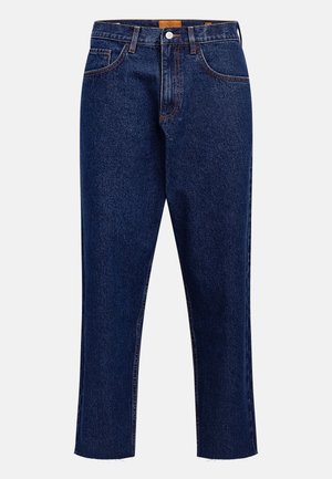 Dark blue denim jeans with a straight leg, high waist, five pockets, and contrast stitching. Features a raw hem at the ankle.