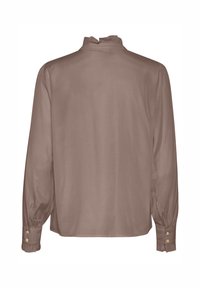 Långärmad blus i mjukt taupe-tyg, med en volangkrage och knäppte manchetter. Slät textur med lös passform.
