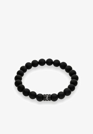 Zwart siliconen kralenarmband met gladde, matte kralen en een metalen accent met gravure. Rond ontwerp, elastische pasvorm.