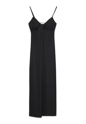 Black, sleeveless dress with a pleated bodice and a straight, floor-length skirt. Features thin straps and a front knot detail.