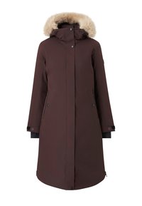 Bruine parka jas met een capuchon gevoerd met bont, rits- en knoopsluitingen, zijzakken, lange mouwen en zwarte stofaccenten bij de manchetten.