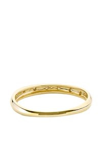 Zelta aproce ar gludu, noapaļotu dizainu. Iezīmēta ar pulētu apdari un izgriezumiem iekšpusē, lai nodrošinātu vieglu struktūru.