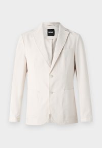 Béžový blazer s jednobarevným designem, dvěma předními kapsami, klopovým límcem a zapínáním na knoflík. Hladká textura s přizpůsobeným střihem.
