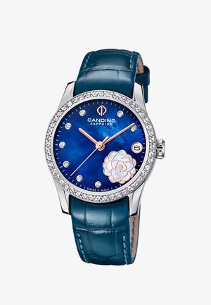 Montre pour femme avec bracelet en cuir bleu, cadran bleu, aiguilles en or rose, index en cristal, motif floral et lunette ornée de cristaux.