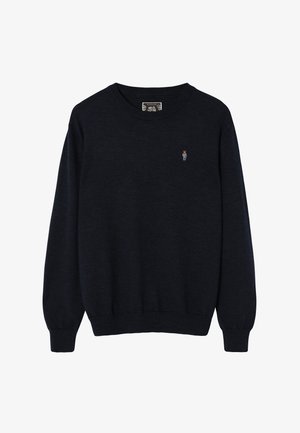 Tummansininen pyöreäkauluksinen collegepaita, valmistettu pehmeästä kankaasta, jossa resorit hihansuissa ja helmassa. Pieni kirjailtu karhu vasemmalla rinnalla.