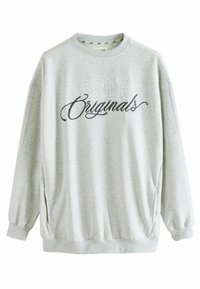 Heled hall sweatpaita ümmarguse kaelusega, langevate õlgadega ja küljetaskutega. Esipoolt kaunistab tumeshallis kutsekirjas ja plokkletterites trükitud tekst "SELF Originals".