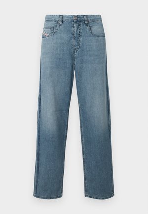 Ljusblå, vida jeans i denim med en klassisk design med fem fickor. Har knapp- och dragkedjestängning samt subtila blekningseffekter på tyget.
