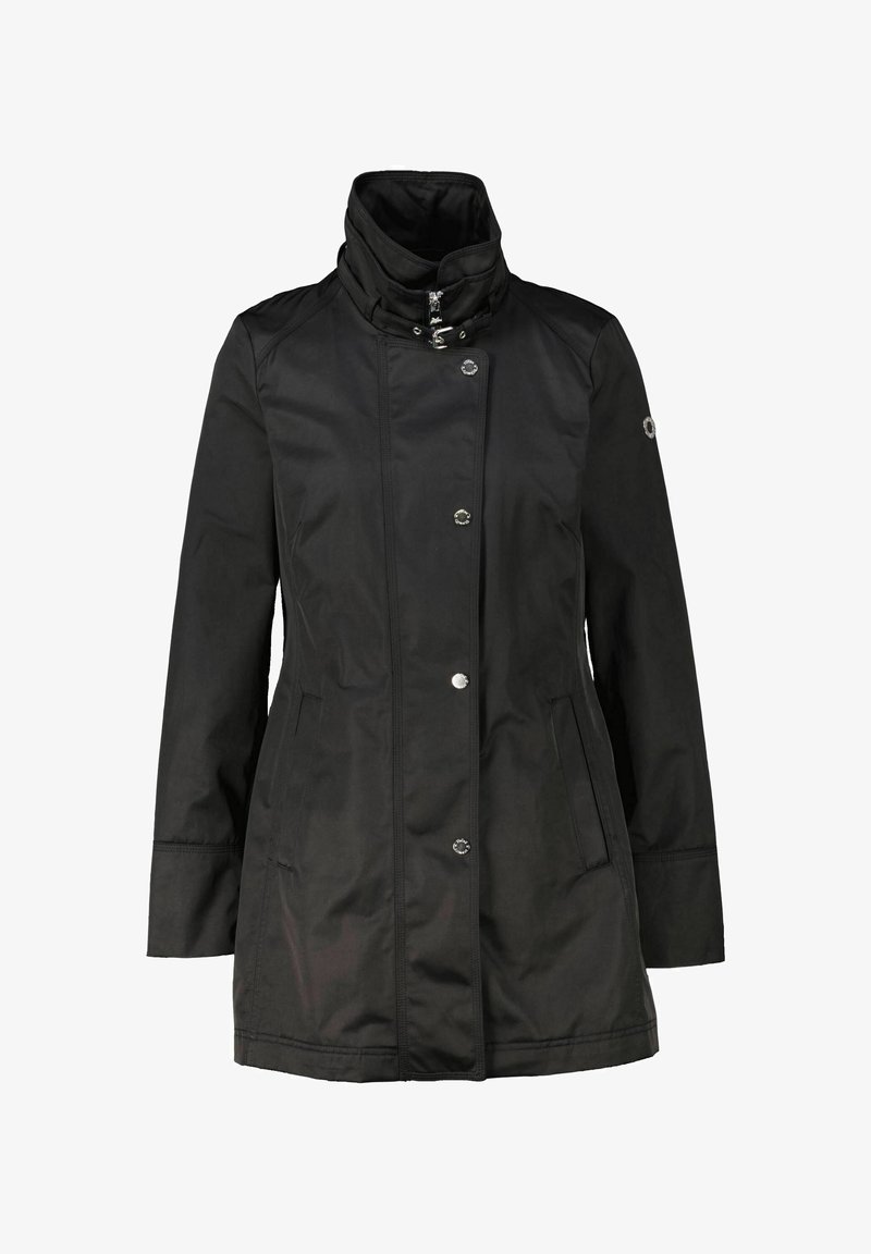 Black waterproof jacket with a high collar, silver snap buttons, two side pockets, and a smooth, matte texture.