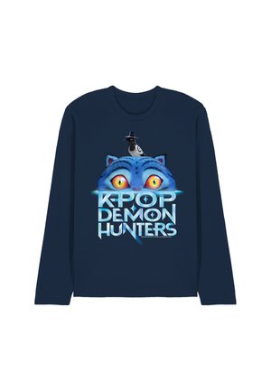 Navy long-sleeve shirt featuring a cartoon blue cat with large yellow eyes and a black hat atop its head with bold "KPOP DEMON HUNTERS" text.